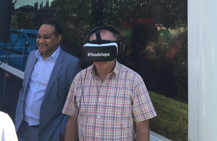 MP Mike Freer tries virtual reality at McDonald's fun day